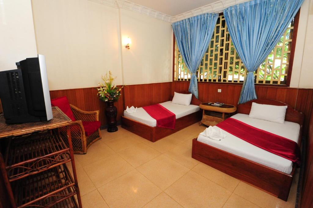 Okay Guesthouse Phnom Penh Oda fotoğraf